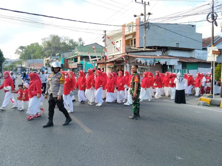 Bhabinkamtibmas Polsek Banggae Kawal Jalan Santai IGTKI Majene, Pastikan Kegiatan Berlangsung Aman